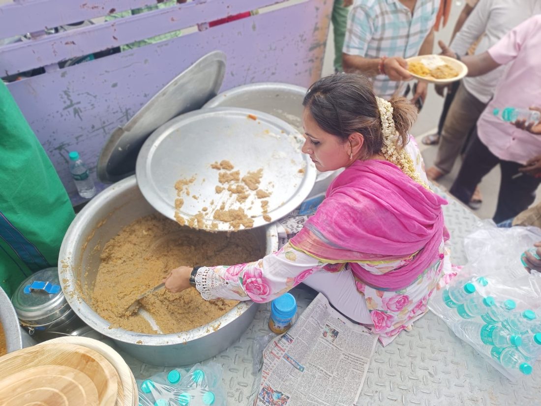 Volunteers serving a community meal